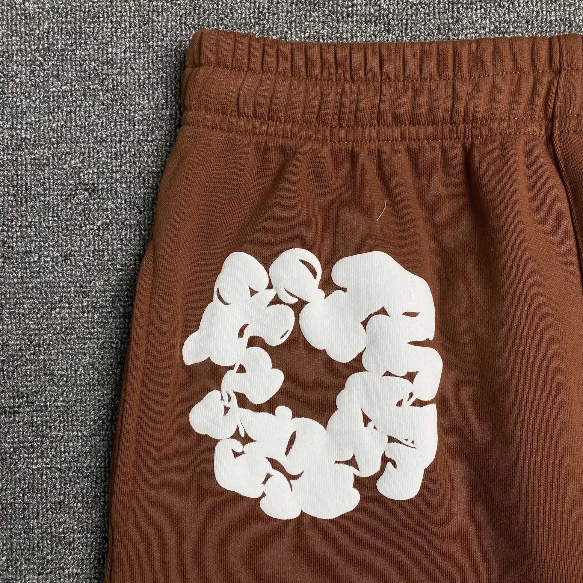 DENIM TEARS COTTON WREATH SWEATPANTS BROWN - Phantom Kicks