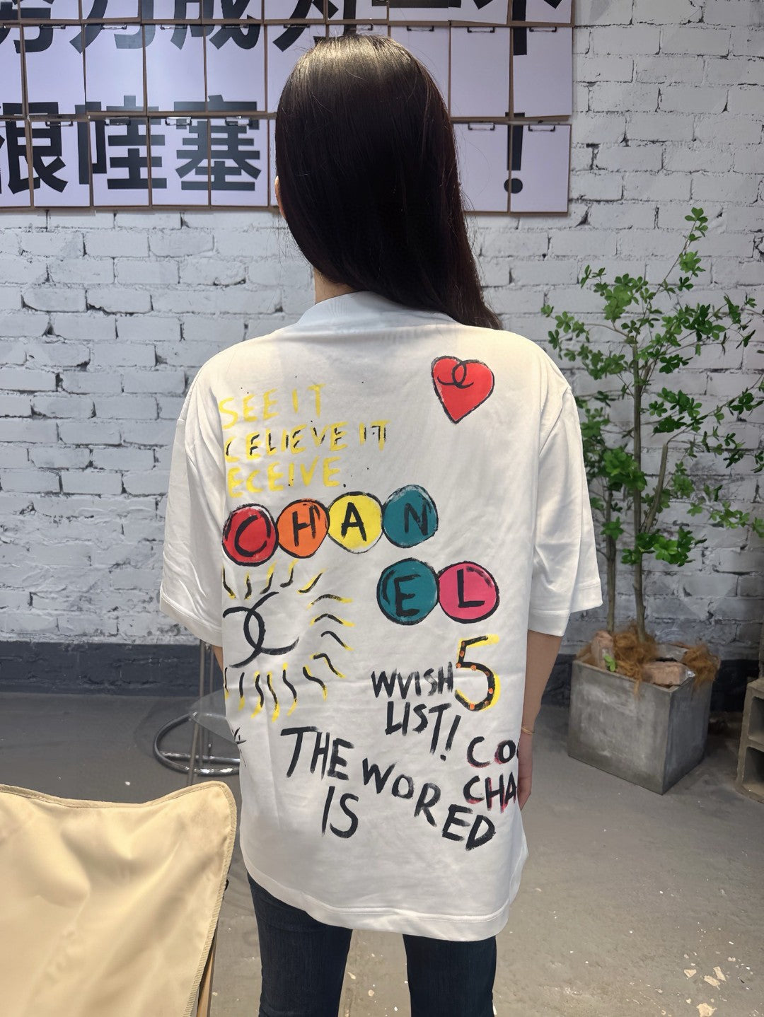 Chanel "Women Will Save The World" T-Shirt in White - Phantom Kicks