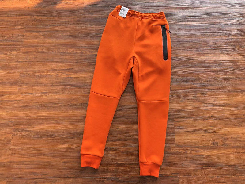 NIKE TECH FLEECE PANTS x CAMPFIRE ORANGE - Phantom Kicks