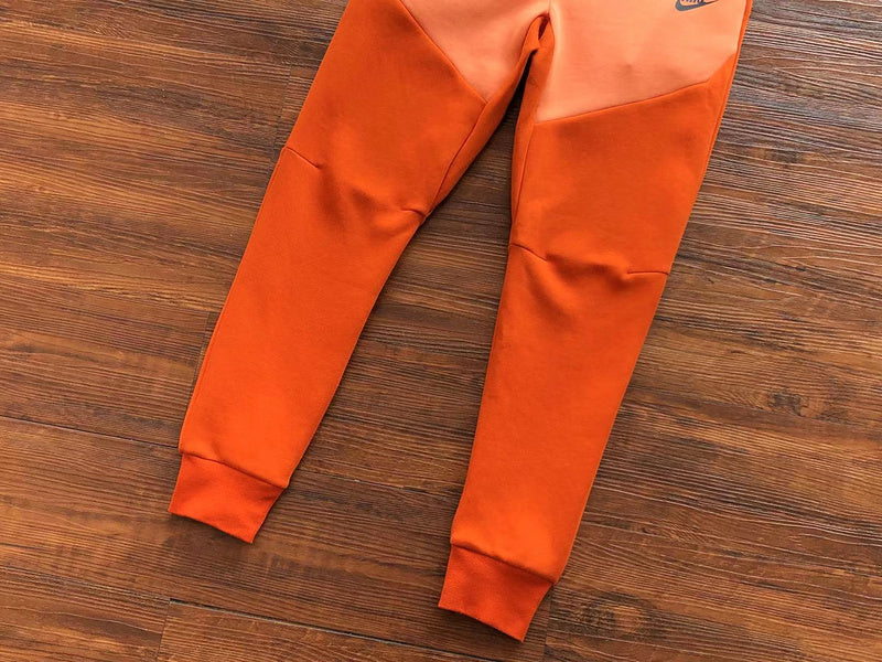 NIKE TECH FLEECE PANTS x CAMPFIRE ORANGE - Phantom Kicks