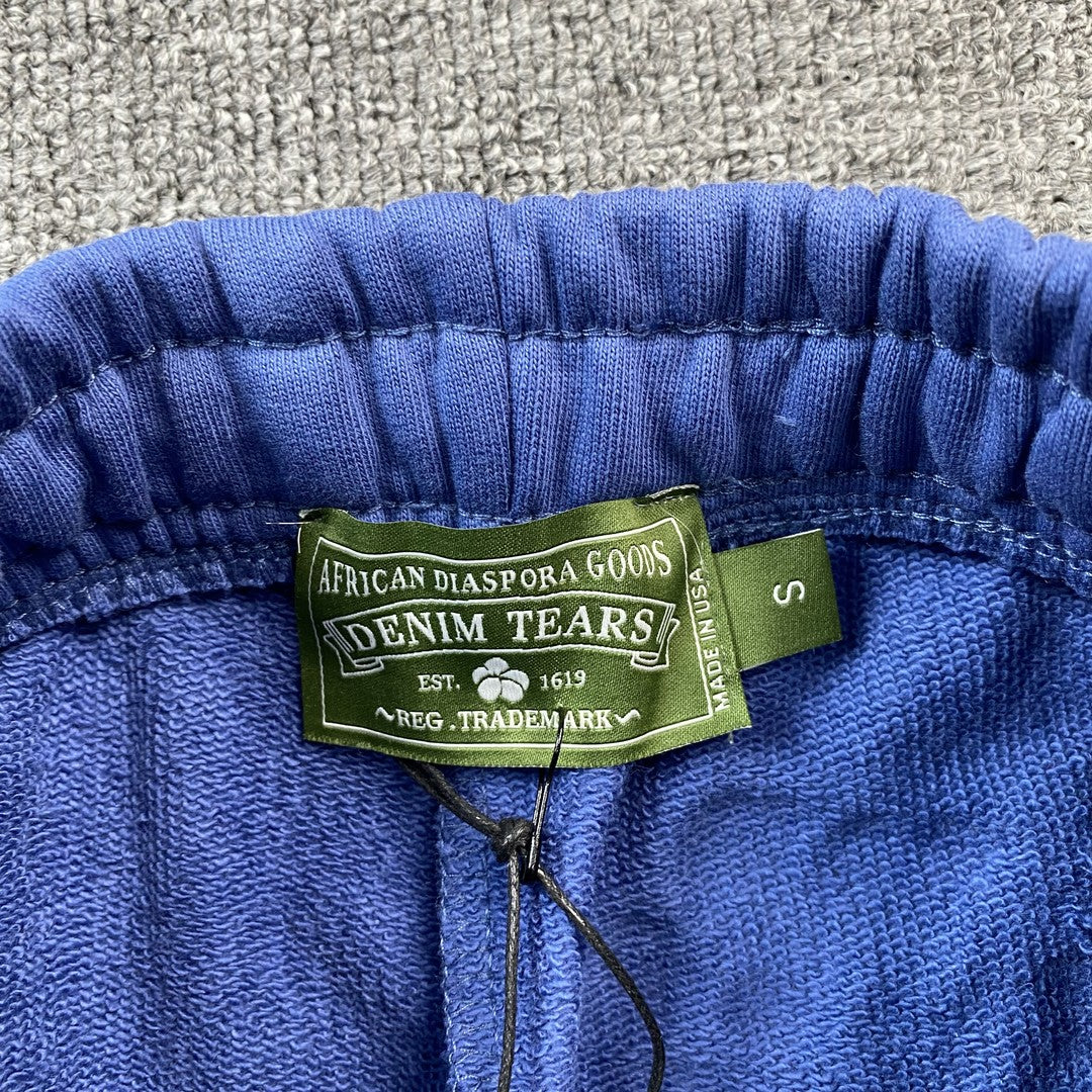 DENIM TEARS COTTON WREATH SWEATPANTS BLUE - Phantom Kicks