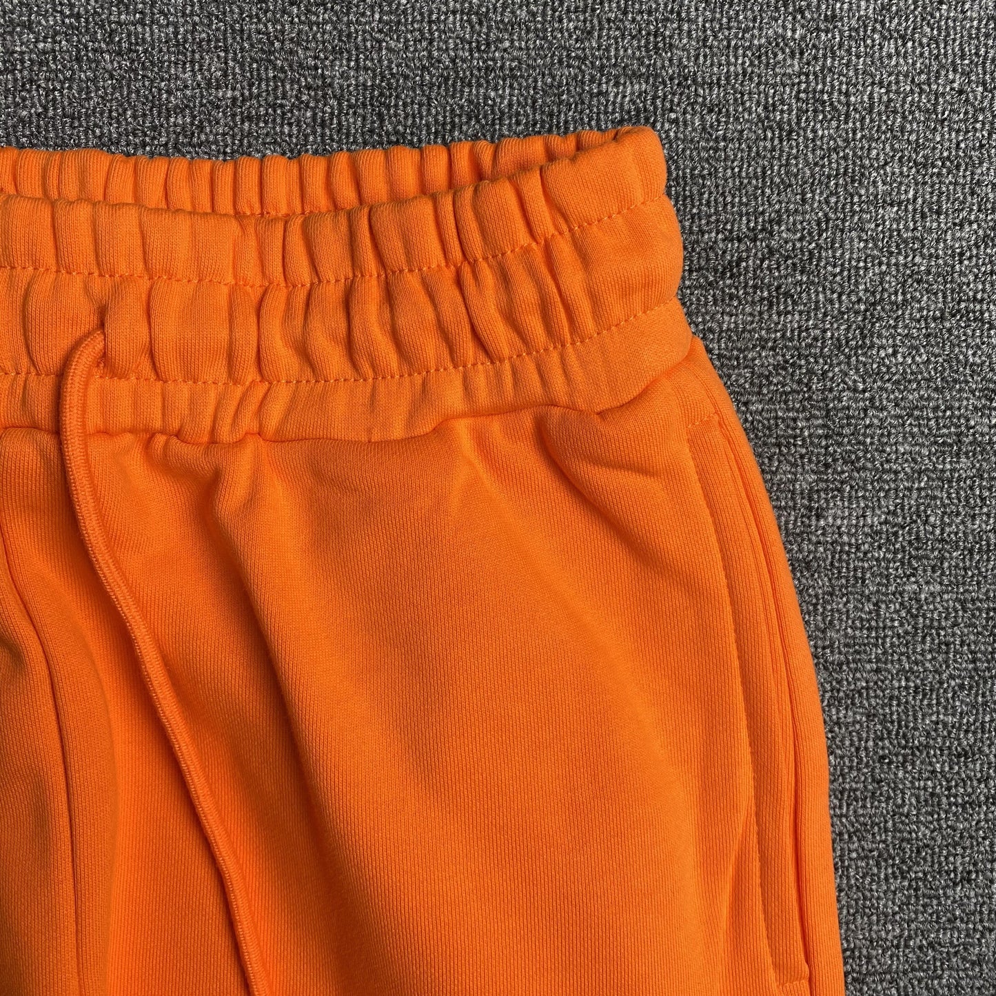 DENIM TEARS COTTON WREATH SWEATPANTS ORANGE - Phantom Kicks
