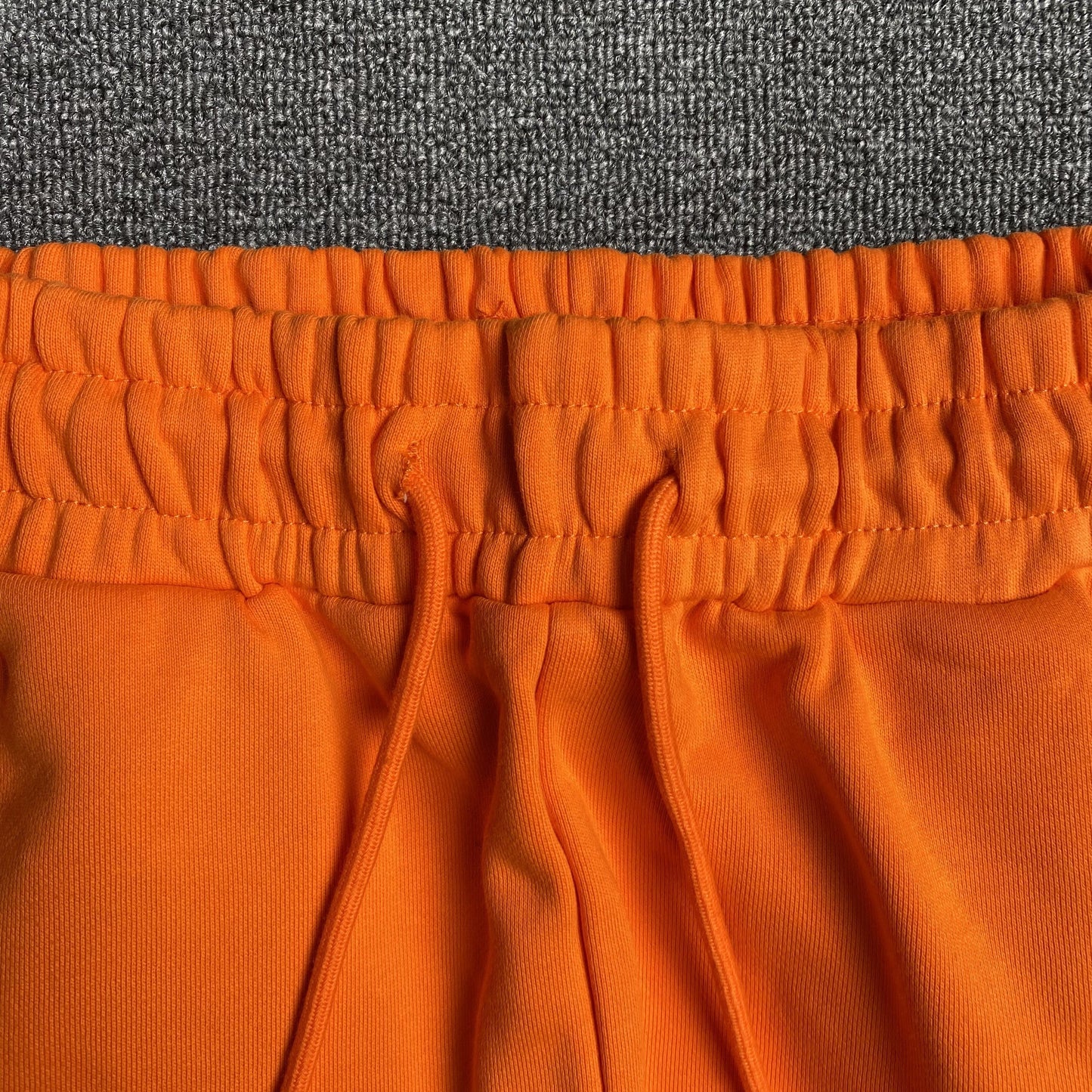DENIM TEARS COTTON WREATH SWEATPANTS ORANGE - Phantom Kicks