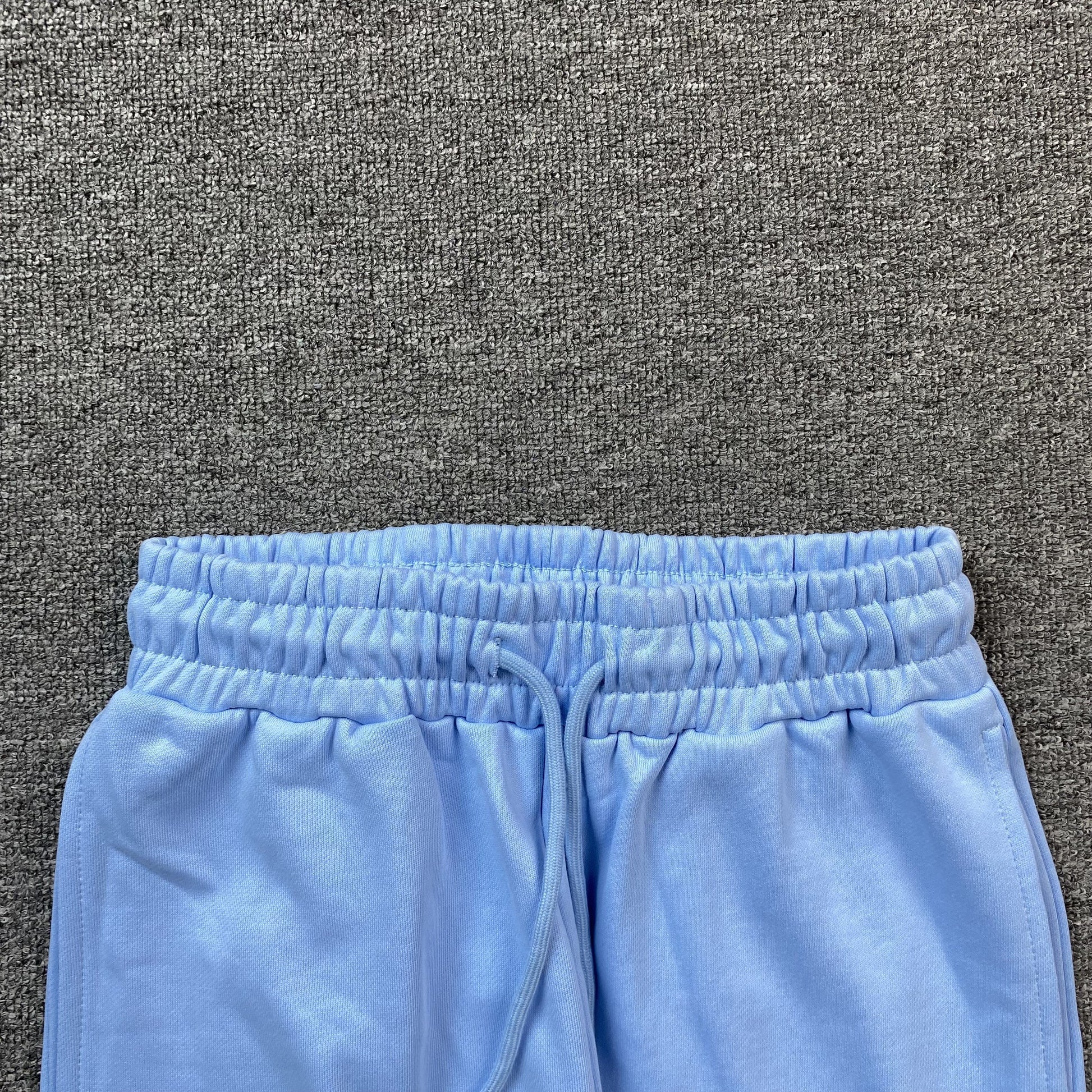 DENIM TEARS COTTON WREATH SWEATPANTS BABY BLUE - Phantom Kicks