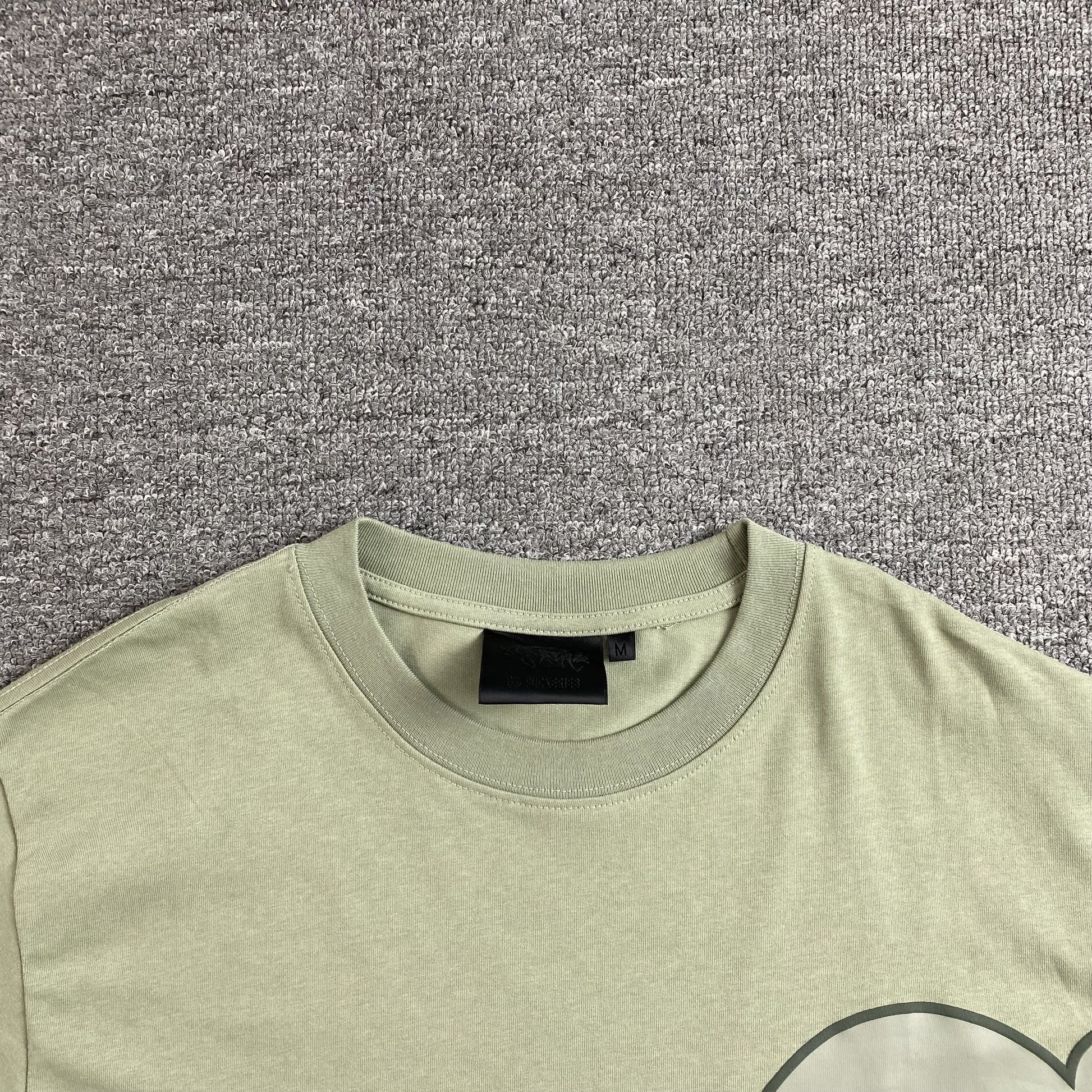 SYNA WORLD T-SHIRT SAGE - Phantom Kicks