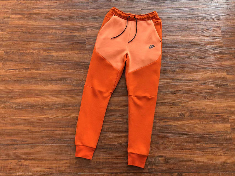 NIKE TECH FLEECE PANTS x CAMPFIRE ORANGE - Phantom Kicks