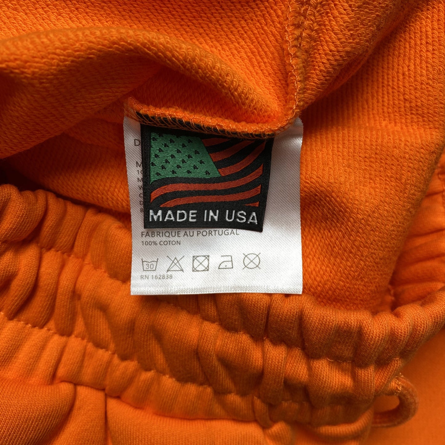 DENIM TEARS COTTON WREATH SWEATPANTS ORANGE - Phantom Kicks