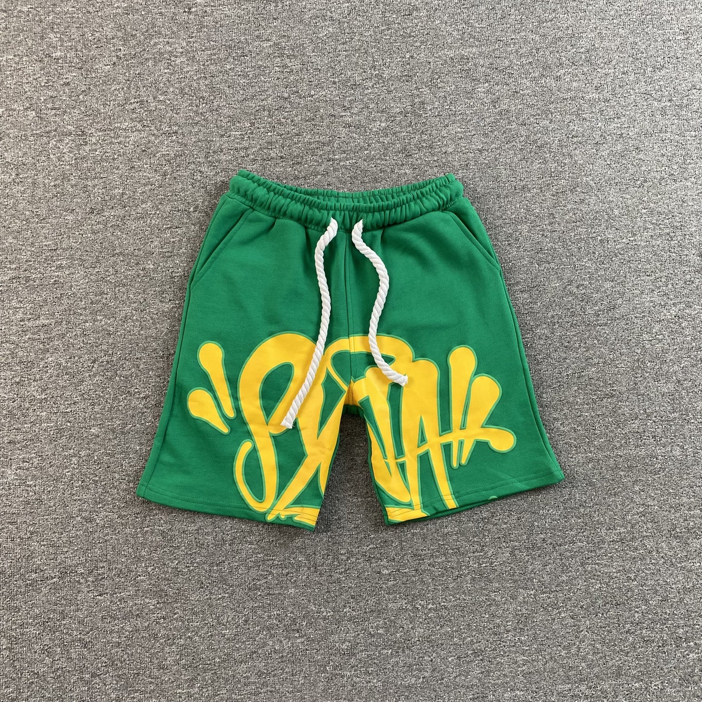 SYNA WORLD SHORTS GREEN - Phantom Kicks