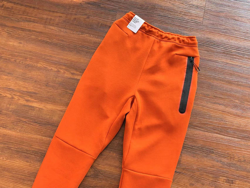 NIKE TECH FLEECE PANTS x CAMPFIRE ORANGE - Phantom Kicks