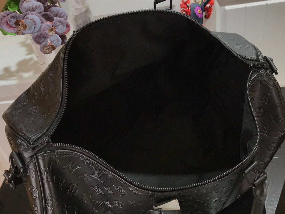 LOUIS VUITTON KEEPBALL 50 BLACK LEATHER TRAVEL BAG - Phantom Kicks