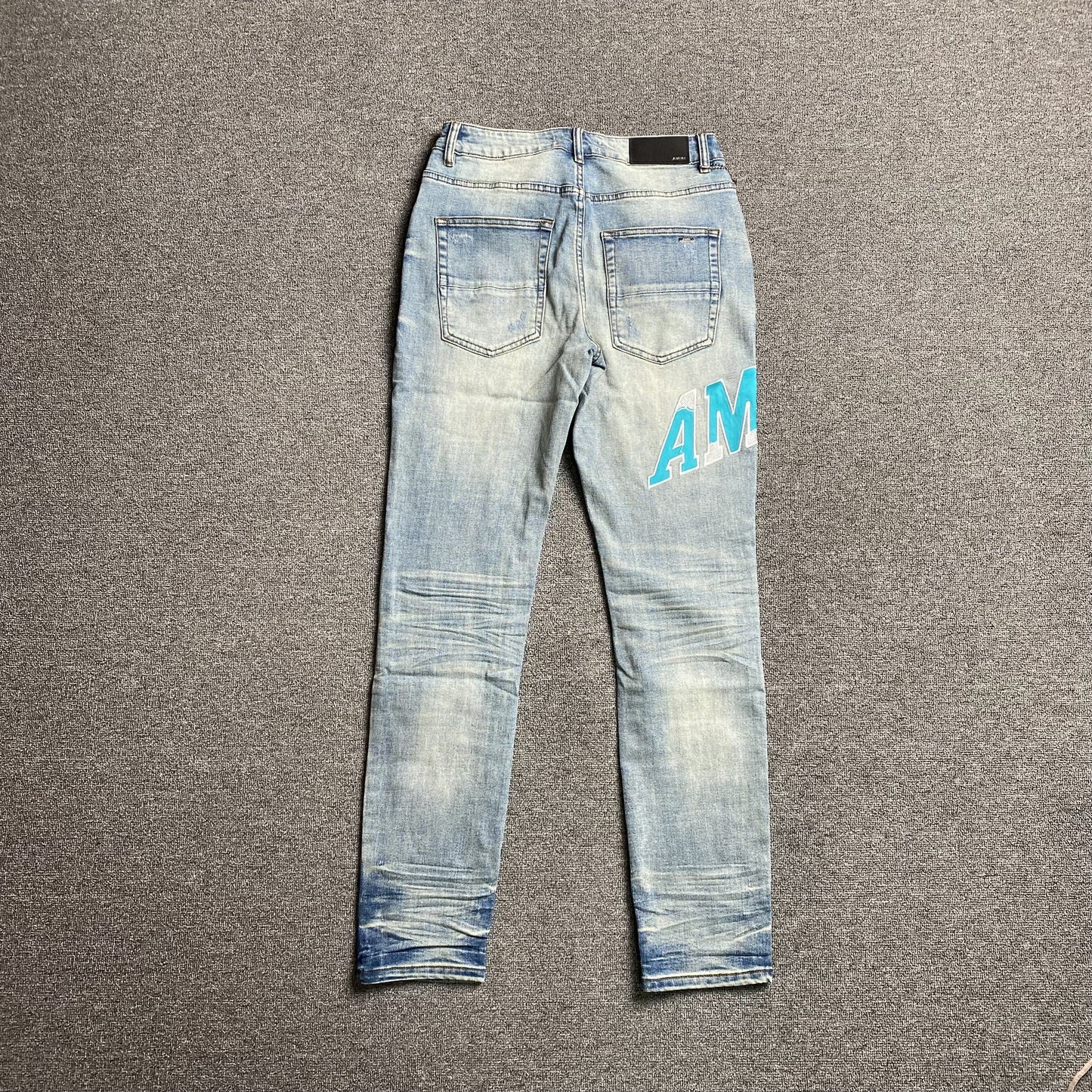 AMIRI VARSITY LOGO JEANS - Phantom Kicks
