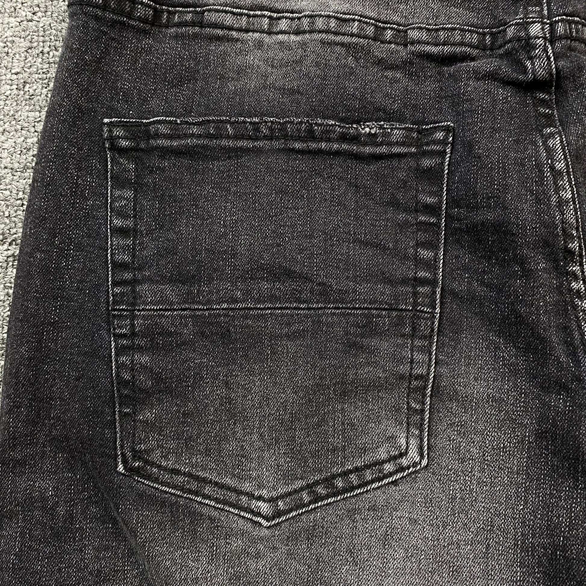 AMIRI VARSITY LOGO REPAIR JEANS - Phantom Kicks