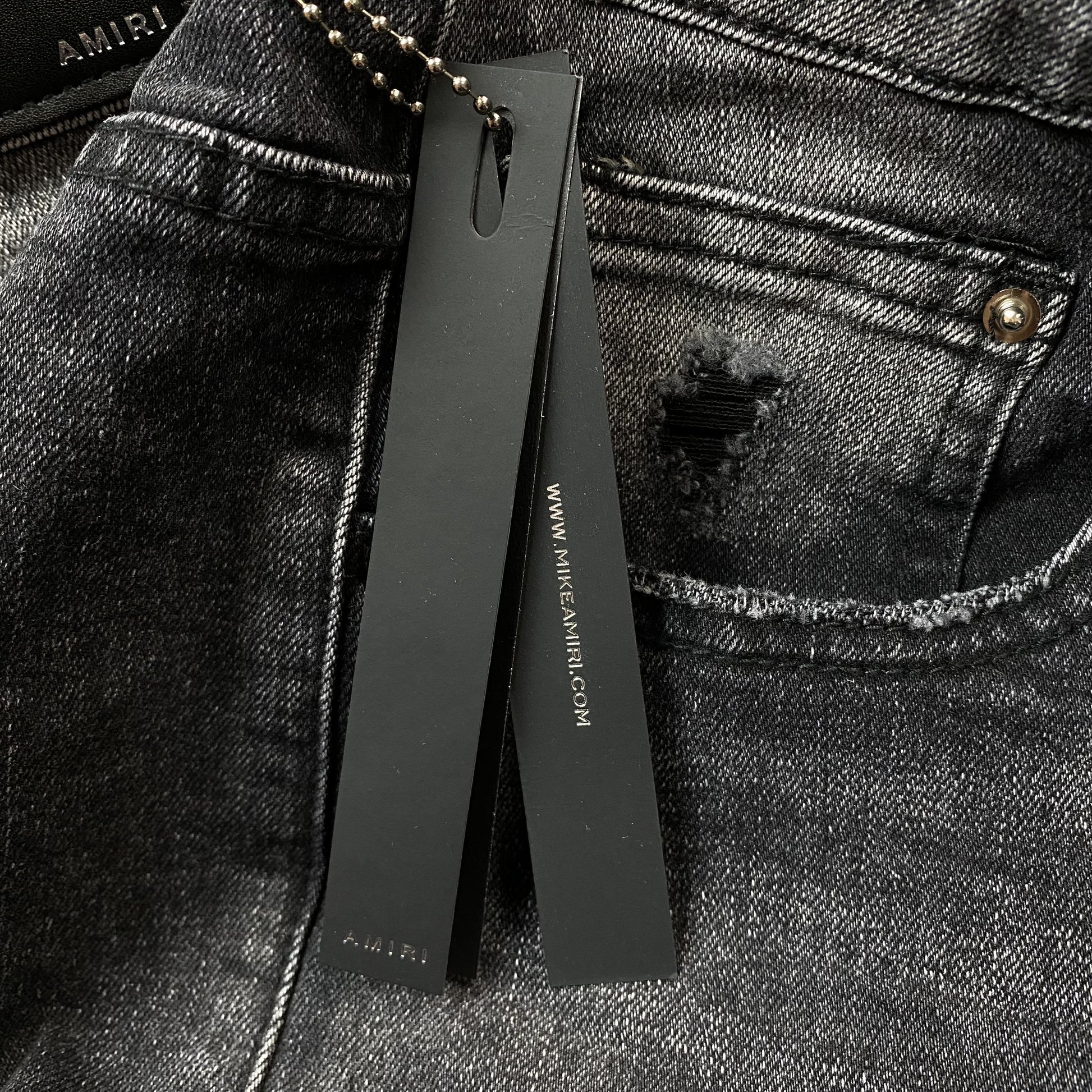 AMIRI VARSITY LOGO REPAIR JEANS - Phantom Kicks