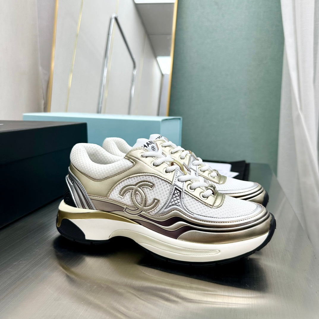 CHANEL CC RUNNERS SNEAKERS WHITE AND GOLD - Phantom Kicks