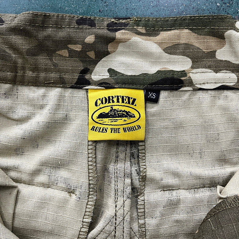 CORTEIZ CARGO PANTS CAMO - Phantom Kicks