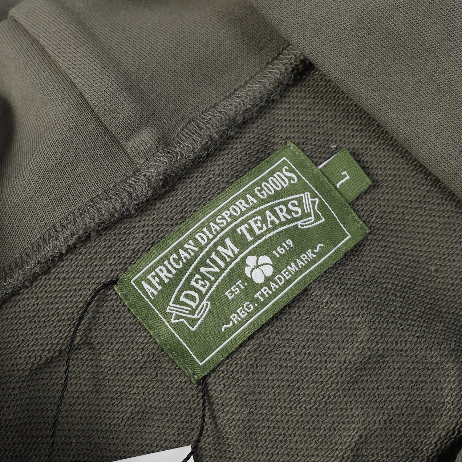 DENIM TEARS COTTON WREATH HOODIE OLIVE - Phantom Kicks