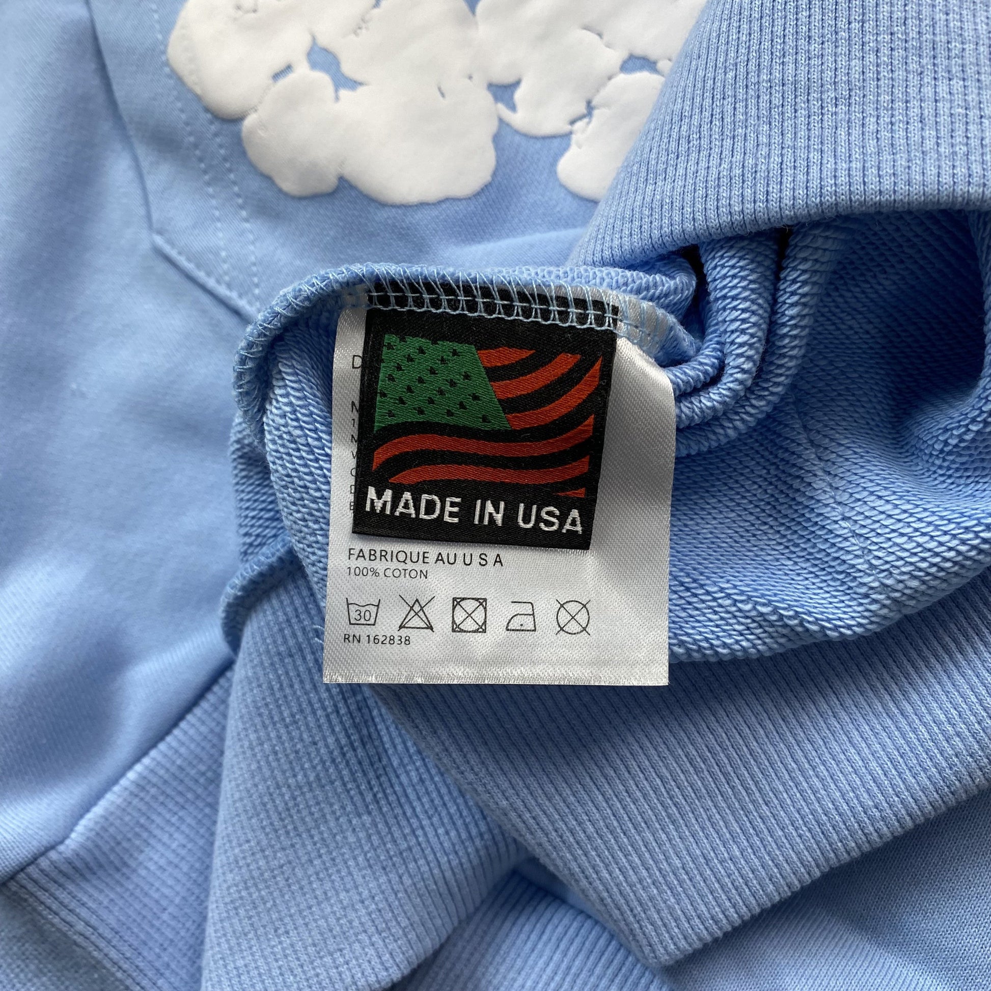 DENIM TEARS COTTON WREATH HOODIE BABY BLUE - Phantom Kicks