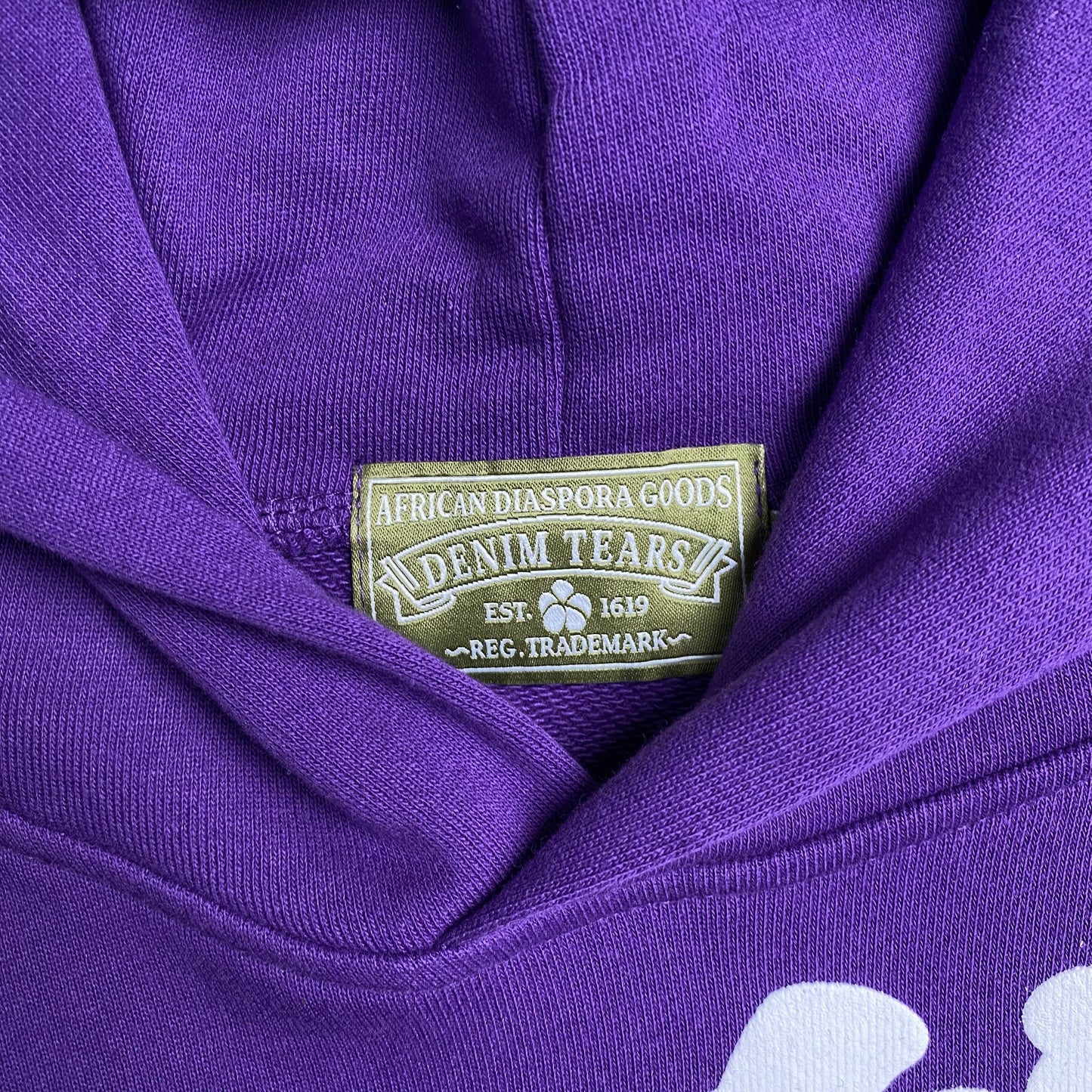 DENIM TEARS COTTON WREATH HOODIE PURPLE - Phantom Kicks