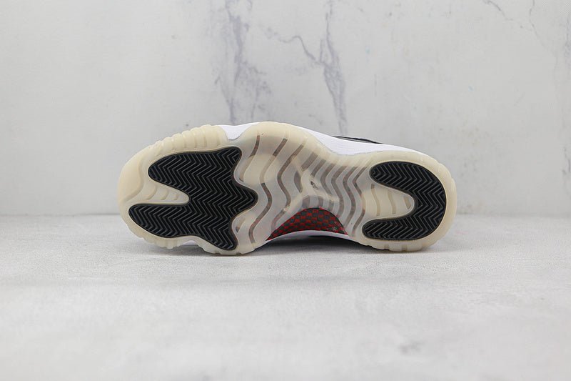 AIR JORDAN 11 RETRO LOW 72-10 BLACK/GYM RED/WHITE/SAIL - Phantom Kicks