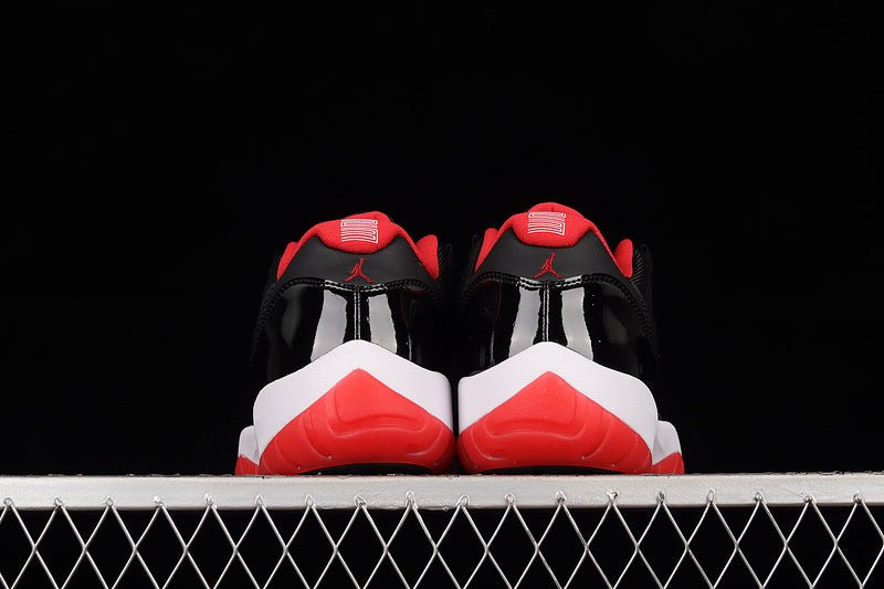 AIR JORDAN 11 RETRO LOW BRED BLACK/TRUE RED/WHITE - Phantom Kicks