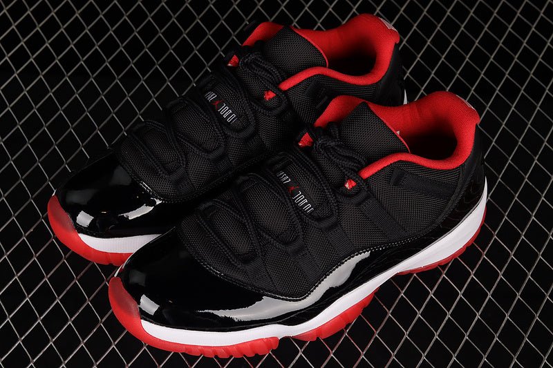 AIR JORDAN 11 RETRO LOW BRED BLACK/TRUE RED/WHITE - Phantom Kicks