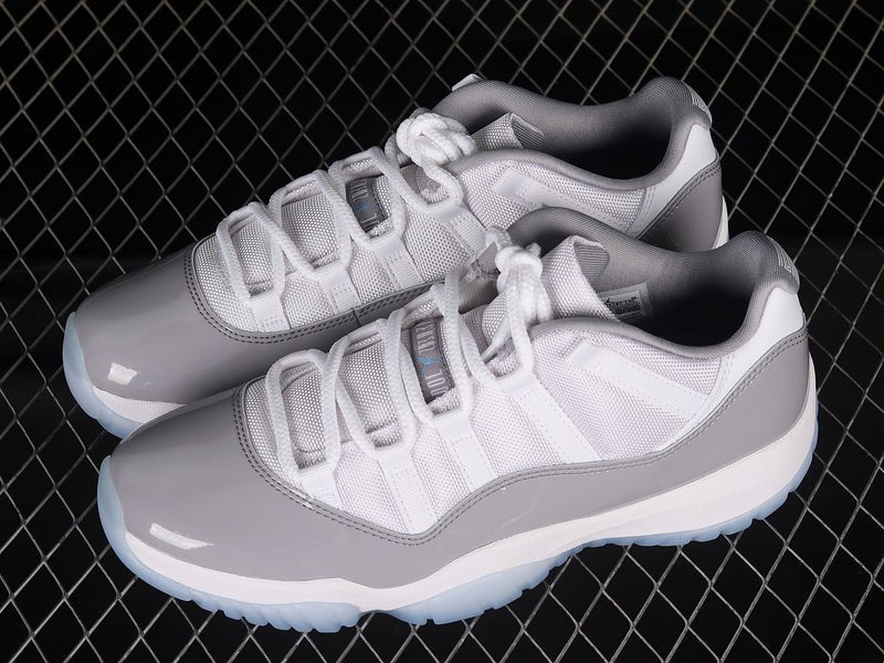 AIR JORDAN 11 RETRO LOW WHITE/UNIVERSITY BLUE - Phantom Kicks