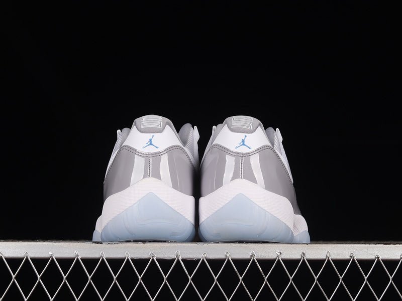 AIR JORDAN 11 RETRO LOW WHITE/UNIVERSITY BLUE - Phantom Kicks