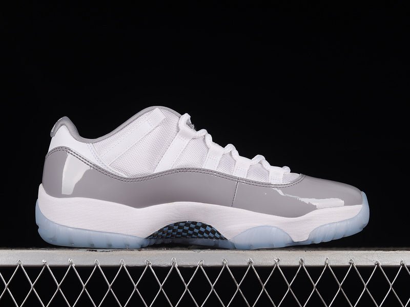 AIR JORDAN 11 RETRO LOW WHITE/UNIVERSITY BLUE - Phantom Kicks