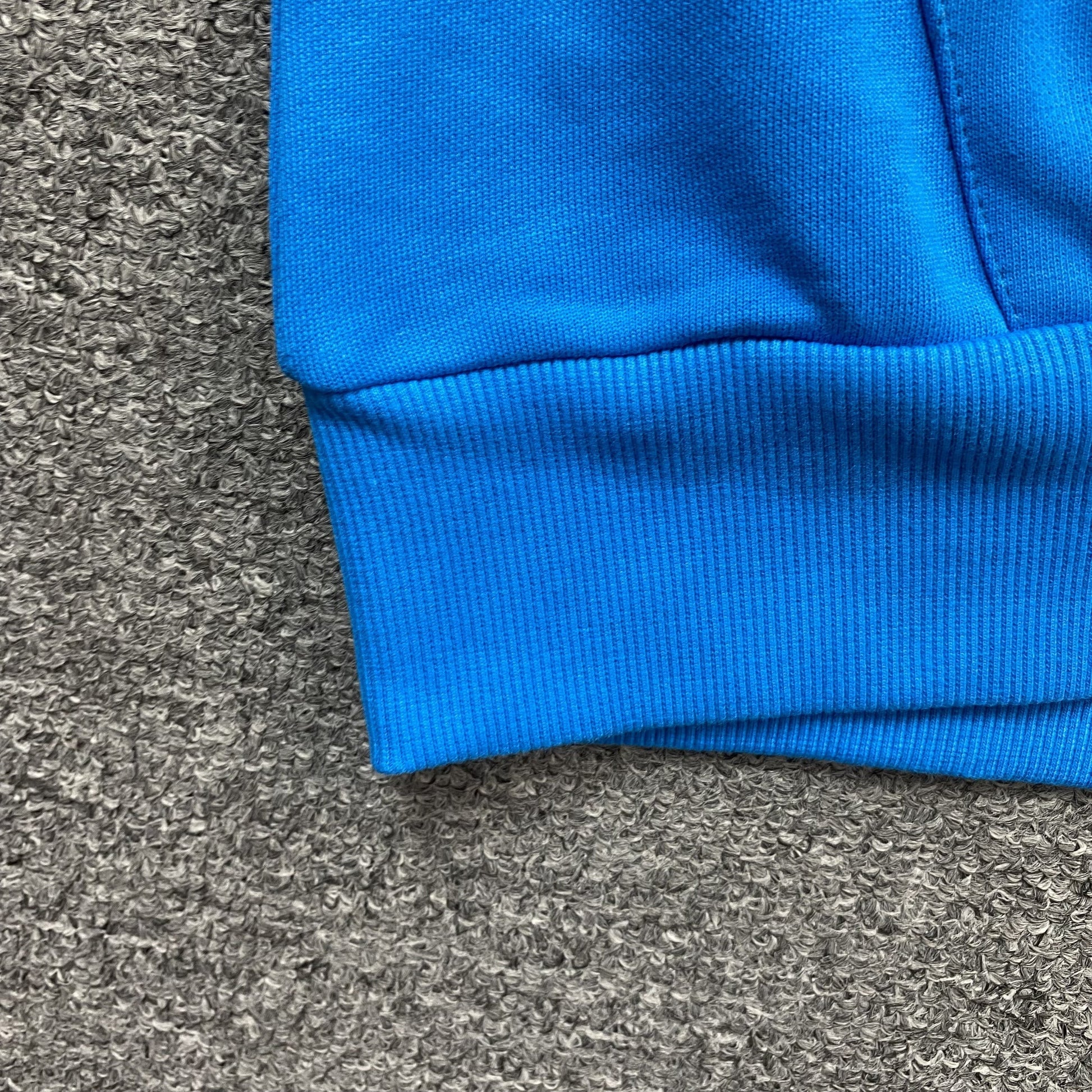 DENIM TEARS COTTON WREATH HOODIE AZURE BLUE - Phantom Kicks