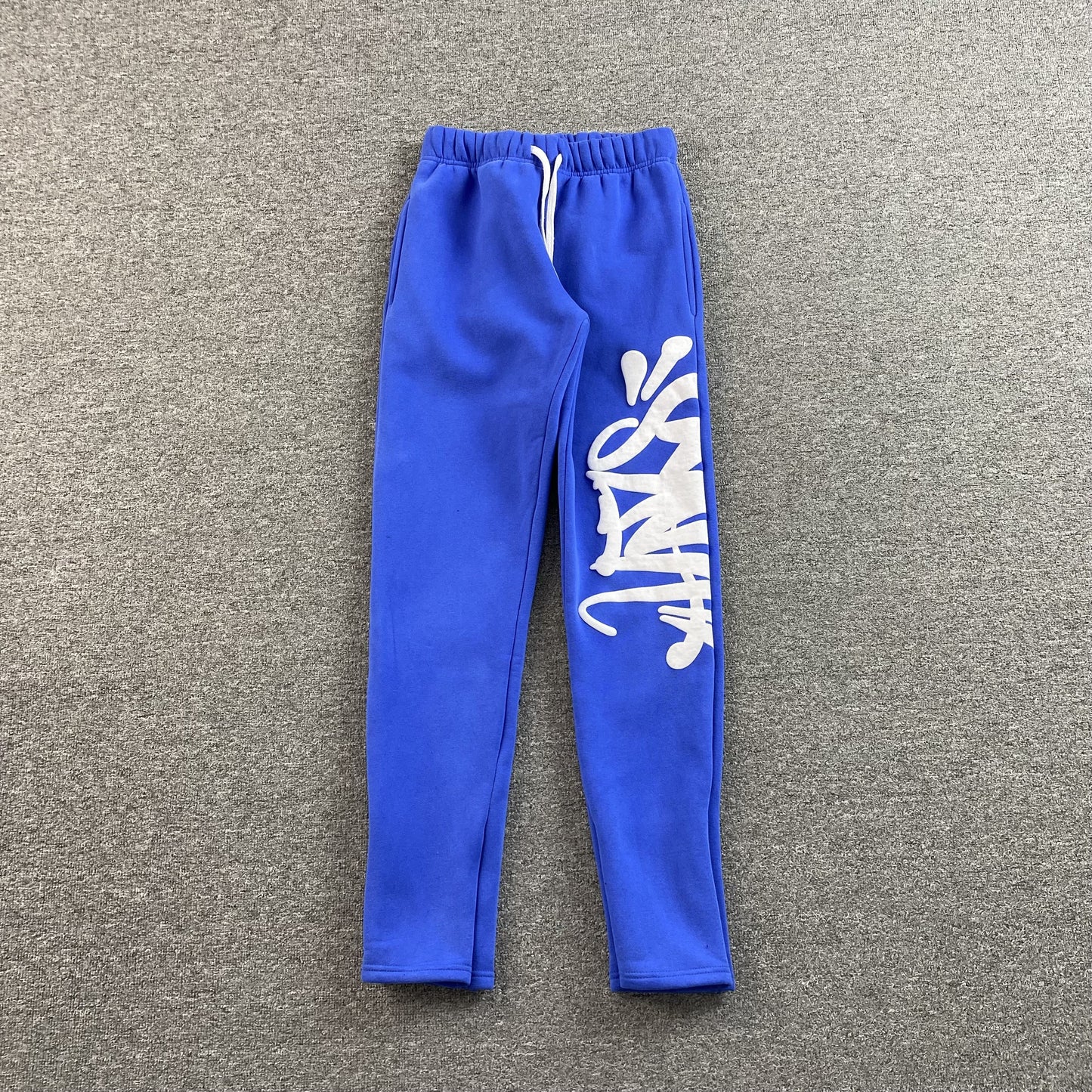 SYNA WORLD SWEATPANTS BLUE - Phantom Kicks