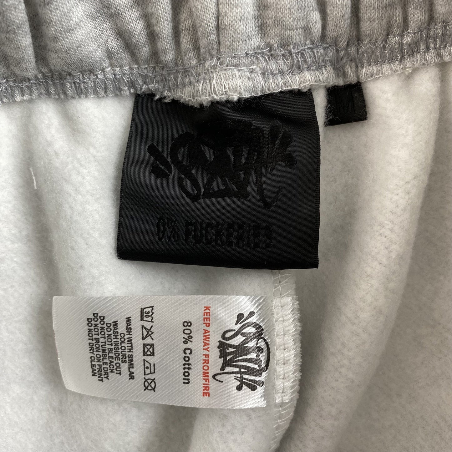 SYNA WORLD COLLEGE SWEATPANTS GREY - Phantom Kicks