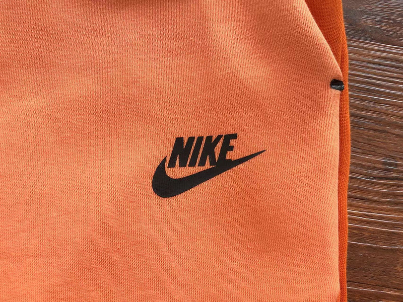 NIKE TECH FLEECE PANTS x CAMPFIRE ORANGE - Phantom Kicks